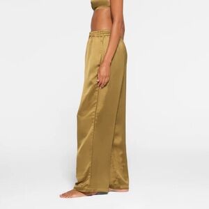 SKIMS Gold Satin Lounge Pants